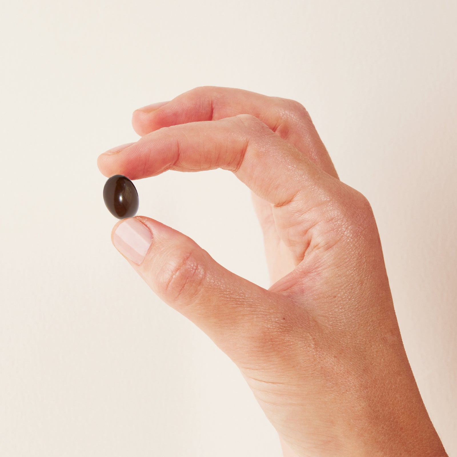 Night Softgel in hand