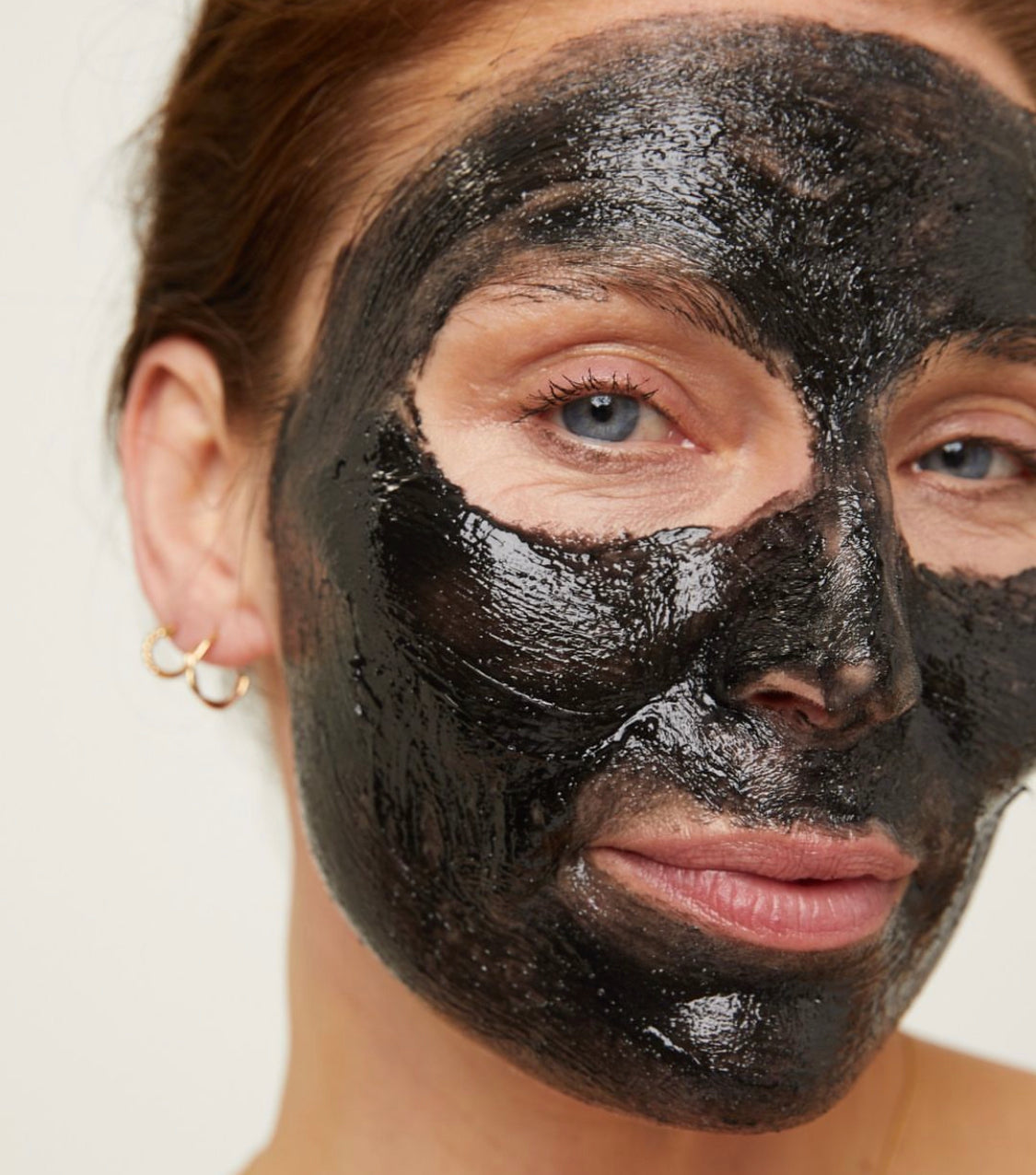 Model with cleanse on face