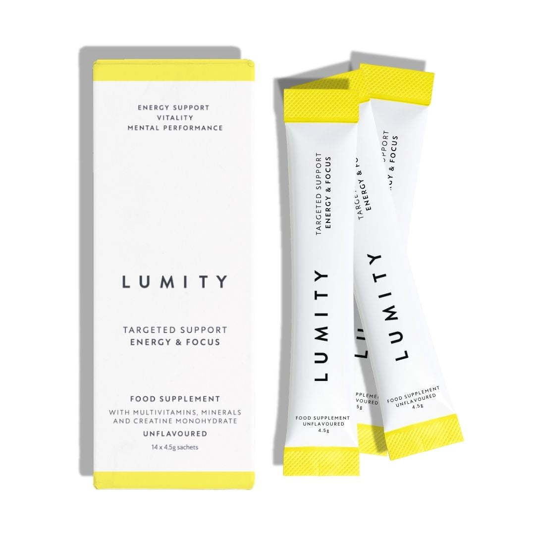 Three Lumity food supplement packets on a white background