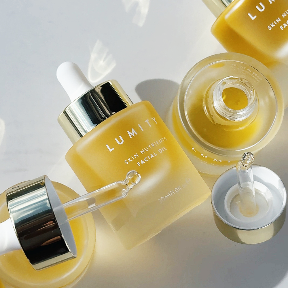 Lumity Skin Nutrients Facial Oil Bottles on a light background