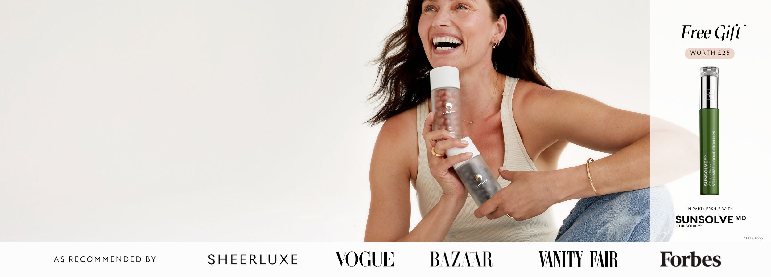 Woman holding a bottle with a free gift offer on the right, featuring multiple magazine logos below.