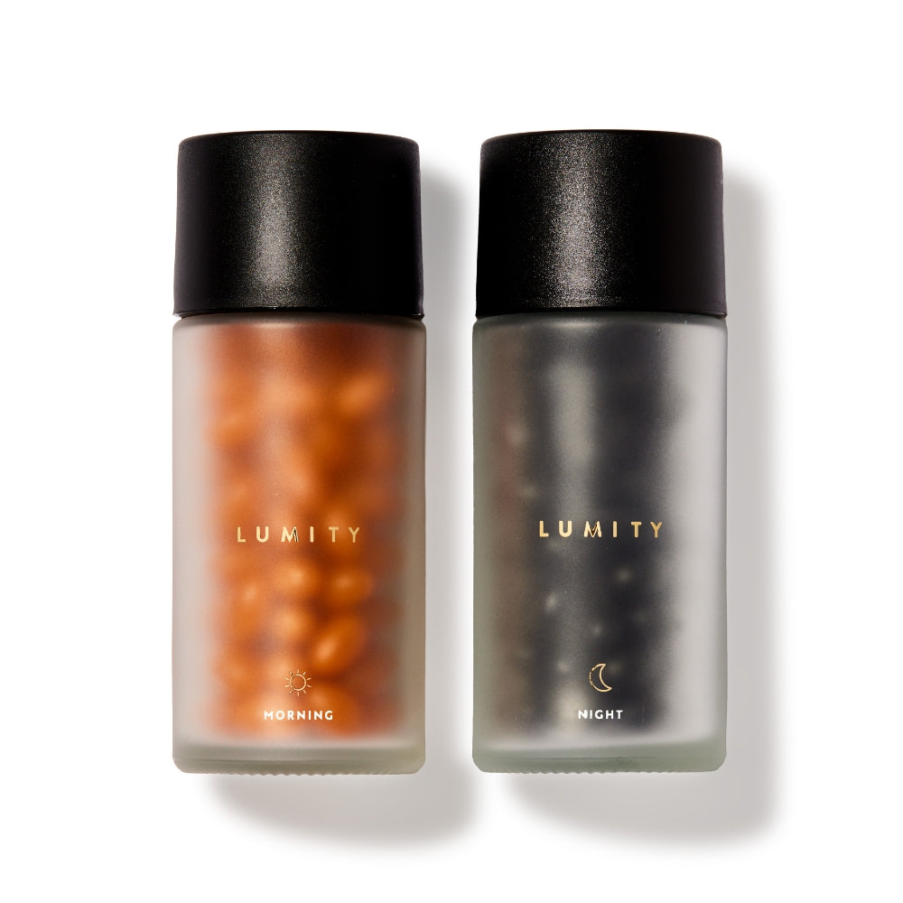 Two Lumity supplement bottles, one labeled 'Morning' and the other 'Night', on a white background.
