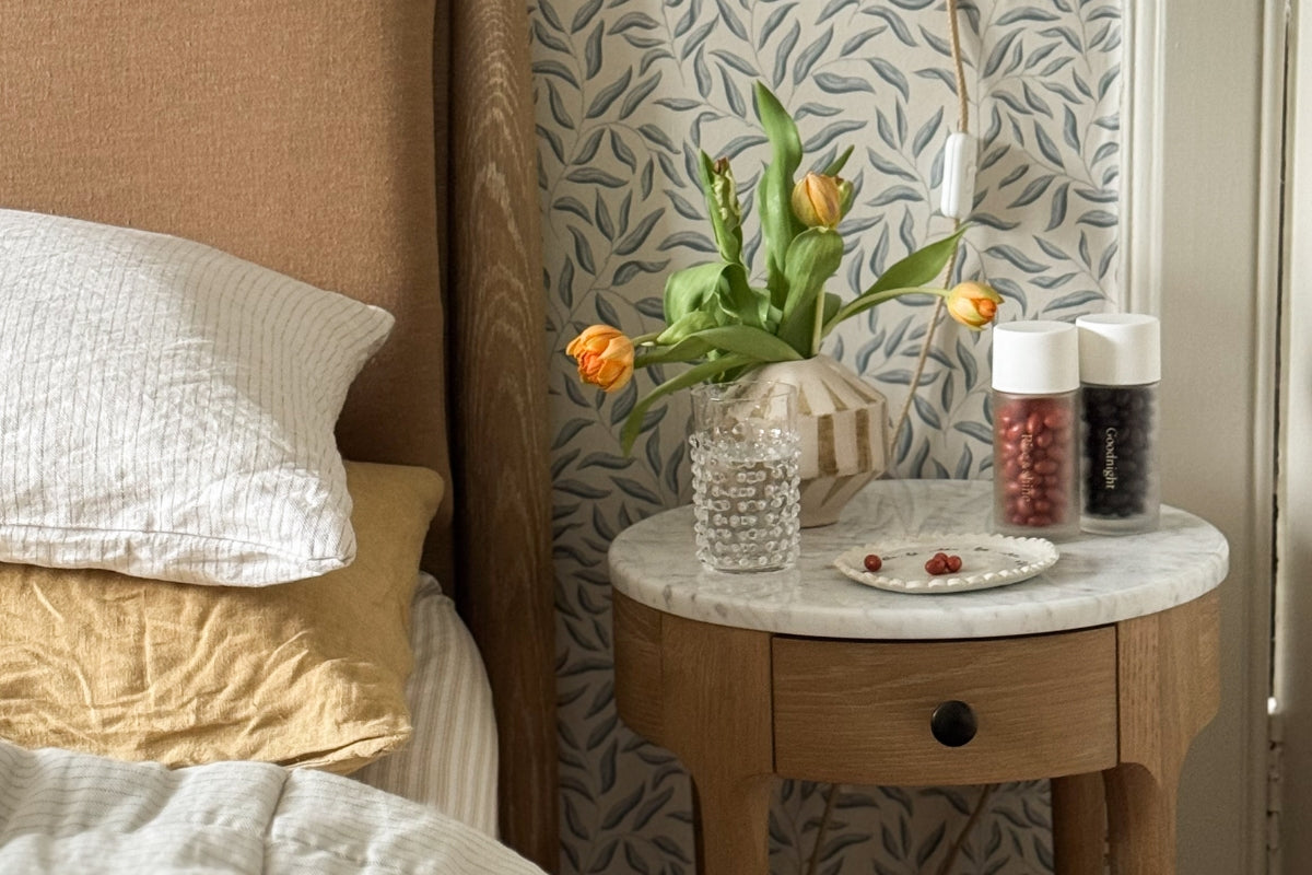 Morning & Night supplement bottles on bedside table
