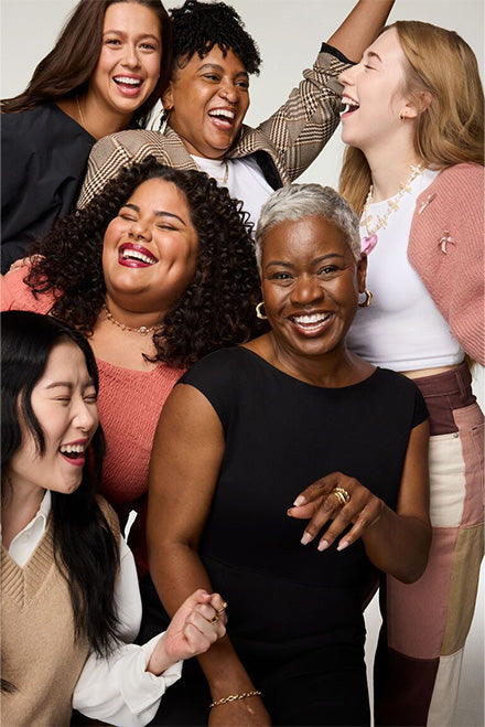Diverse women laughing together