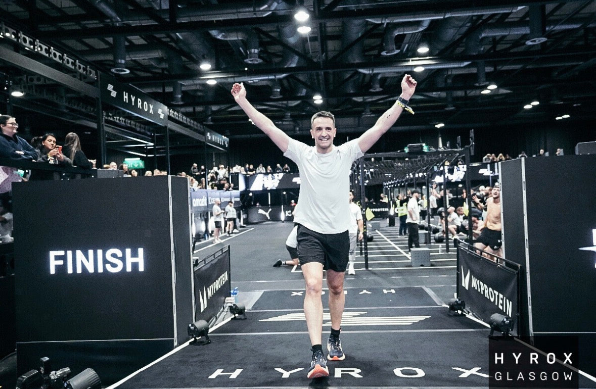 Rory McFadden crossing the finish line