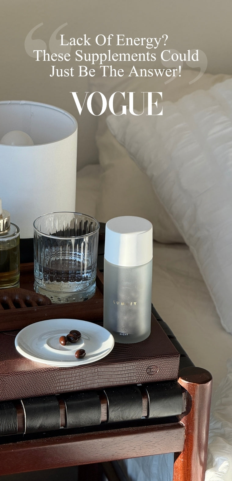 Vogue advertisement for Lumity 
supplements on a table with a glass of water and a plate.