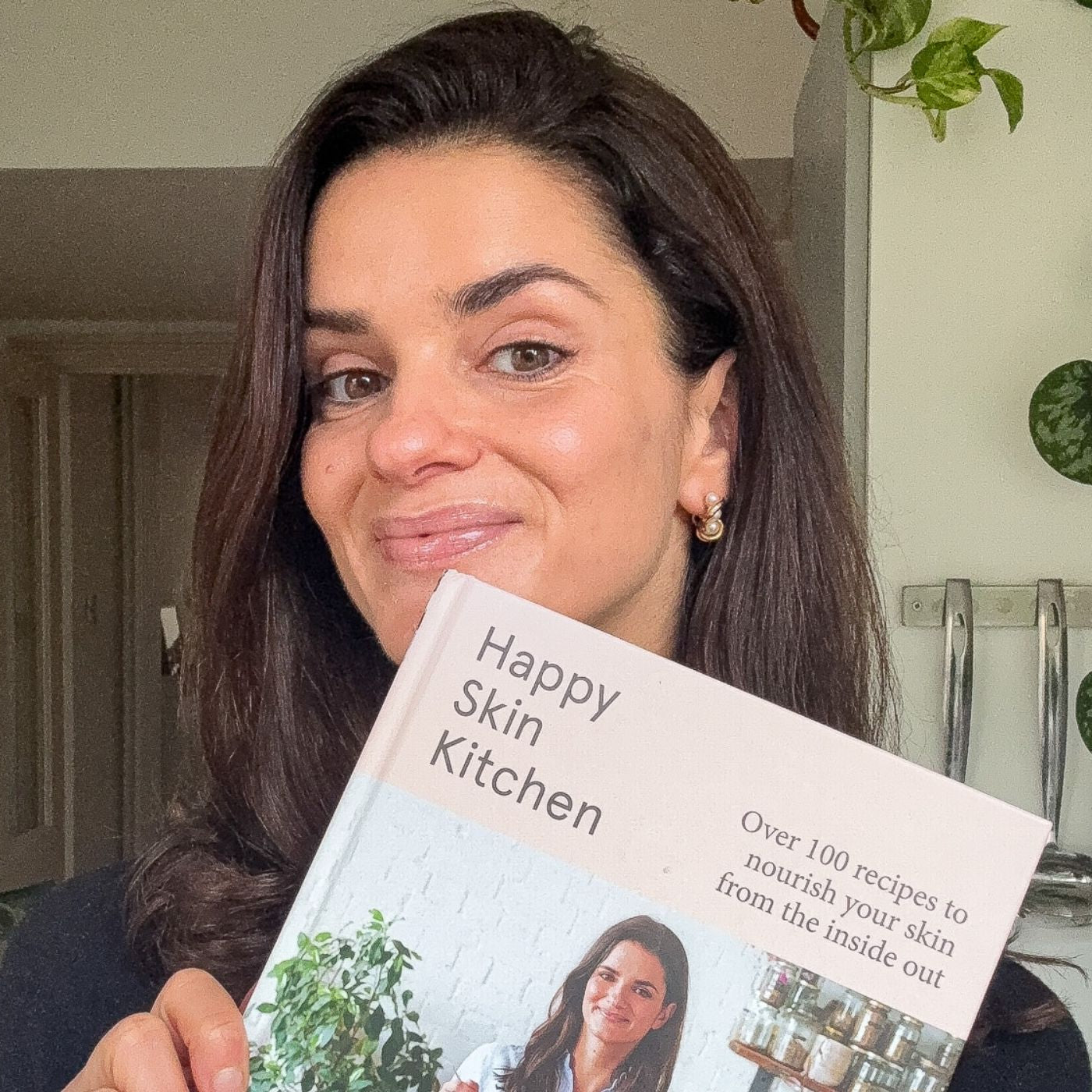 Elisa Rossi with Happy Skin Kitchen cookbook