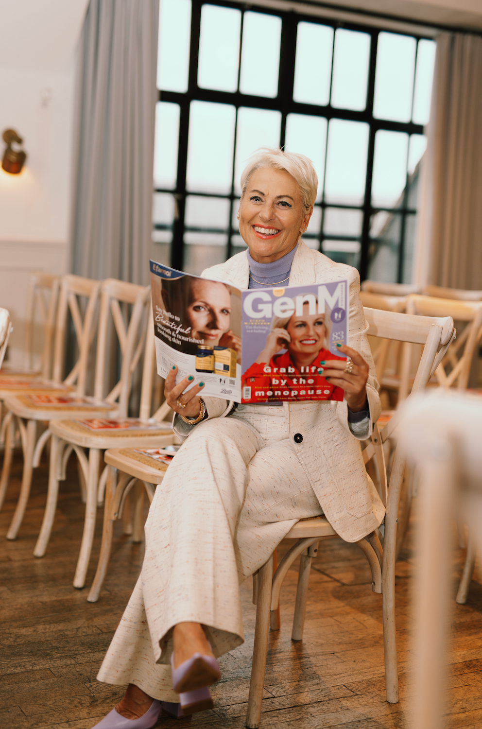 Heather Jackson reading GenM magazine