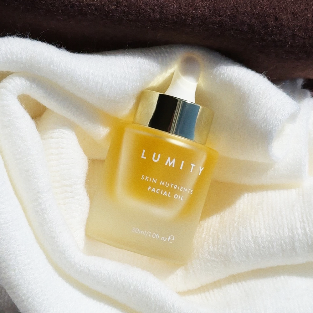 Lumity Skin Nutrients Facial Oil on White Towel 