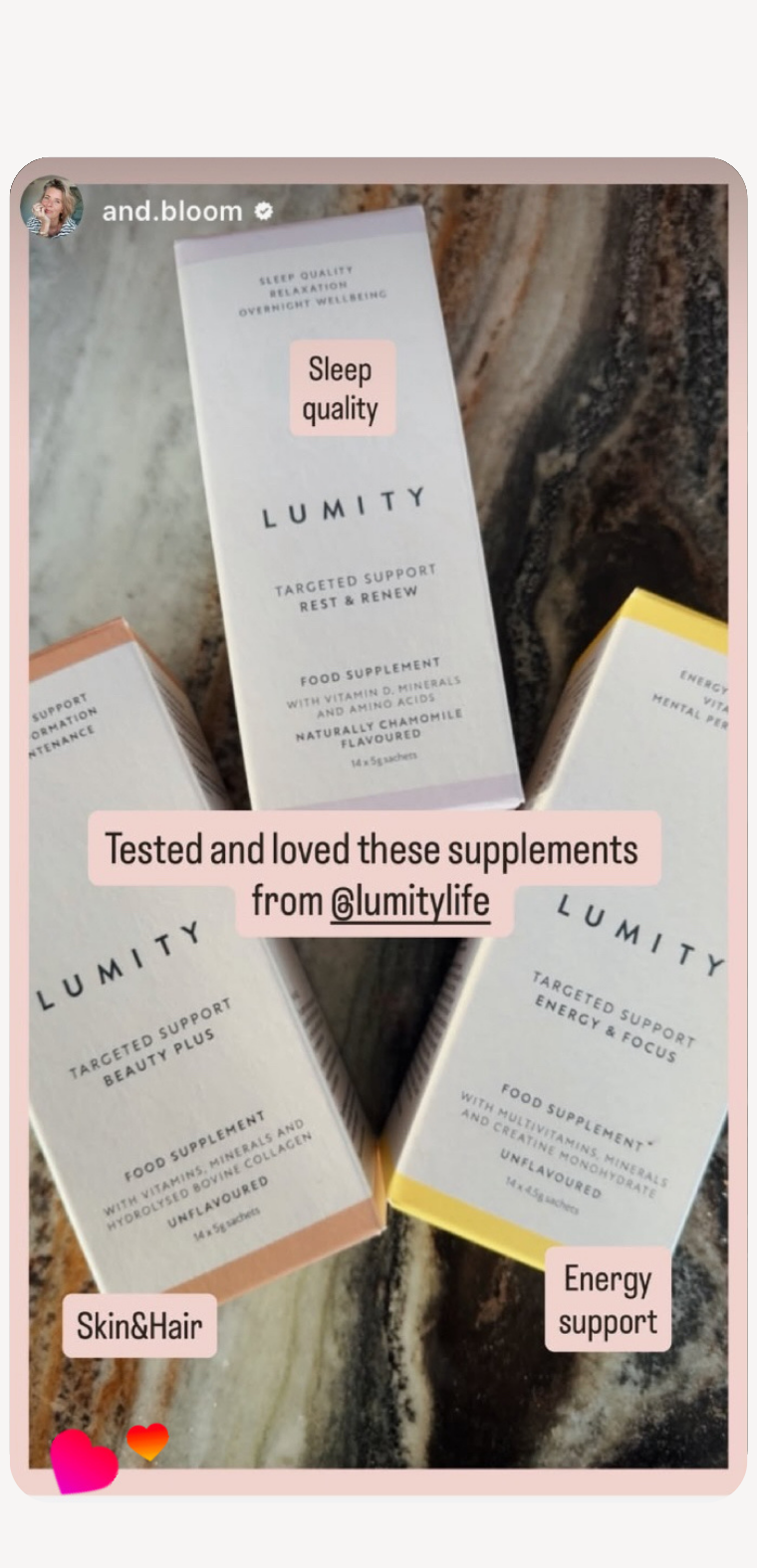 Three Lumity supplement boxes labeled for rest & renew, beauty plus, and energy & focus on a dark marble surface